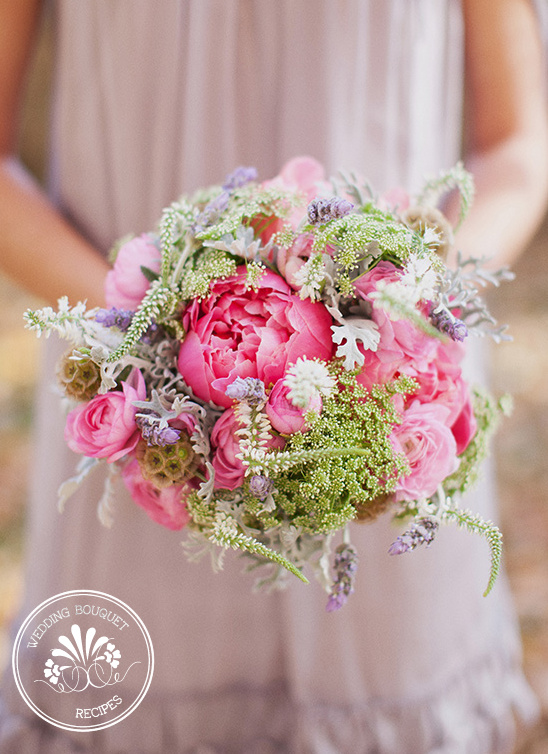 Beautiful pink wedding bouquet with greenery