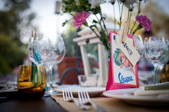 Elegant outdoor wedding table setting with Vespa card