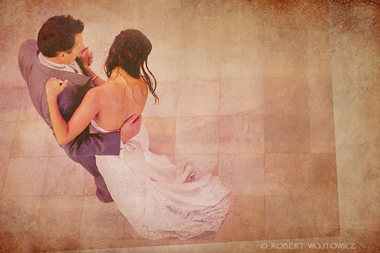 Romantic wedding couple dancing, overhead view