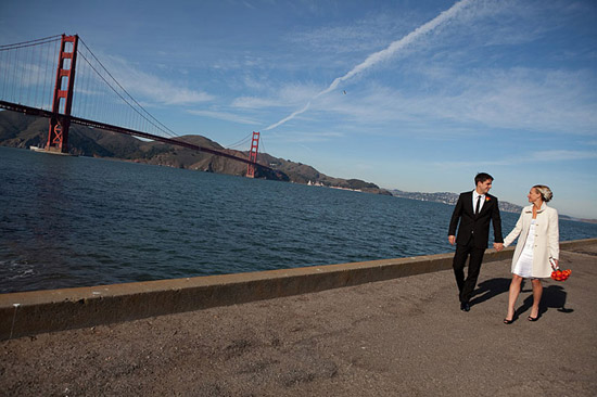 Golden Gate Bridge wedding couple holding hands