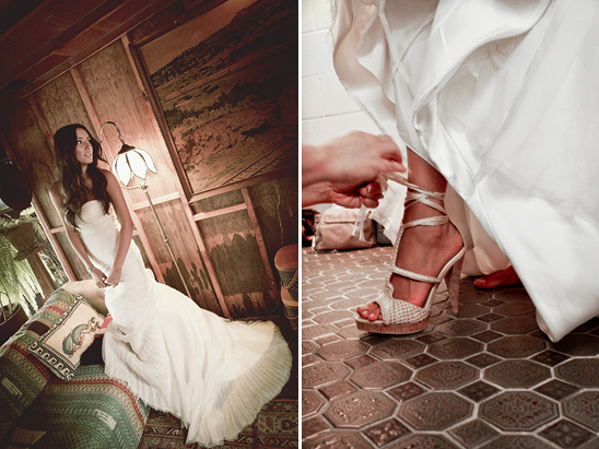Bride in wedding dress getting ready, tying her heels