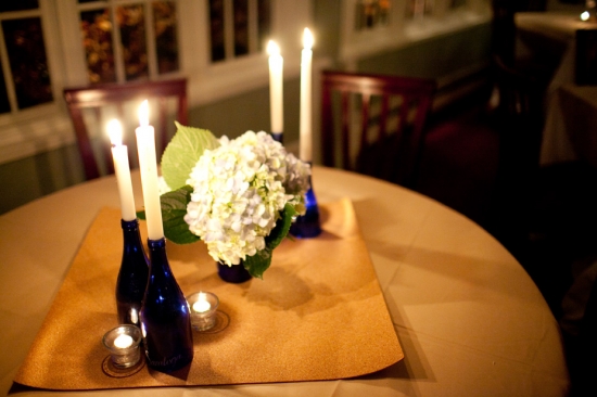 Elegant table setting with candles and hydrangeas