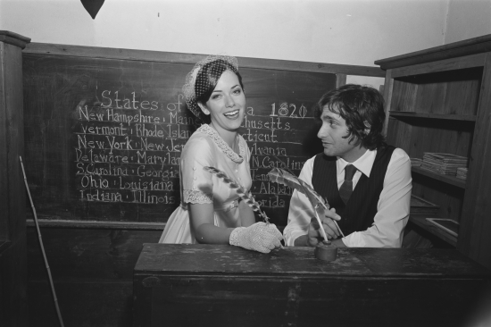Vintage classroom scene with teacher and student