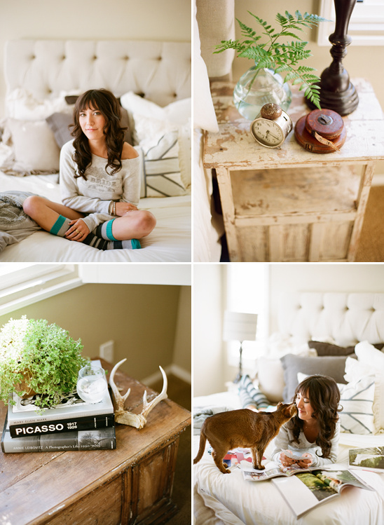 Woman relaxing in bedroom, cat on bed