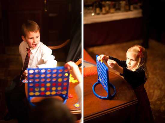 Kids playing Connect Four game indoor fun