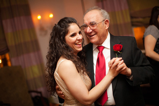 Bride and father share a joyful dance at her wedding