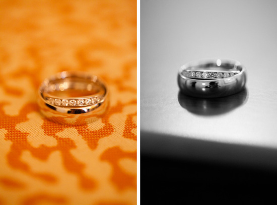 Diamond wedding bands on orange fabric and silver surface