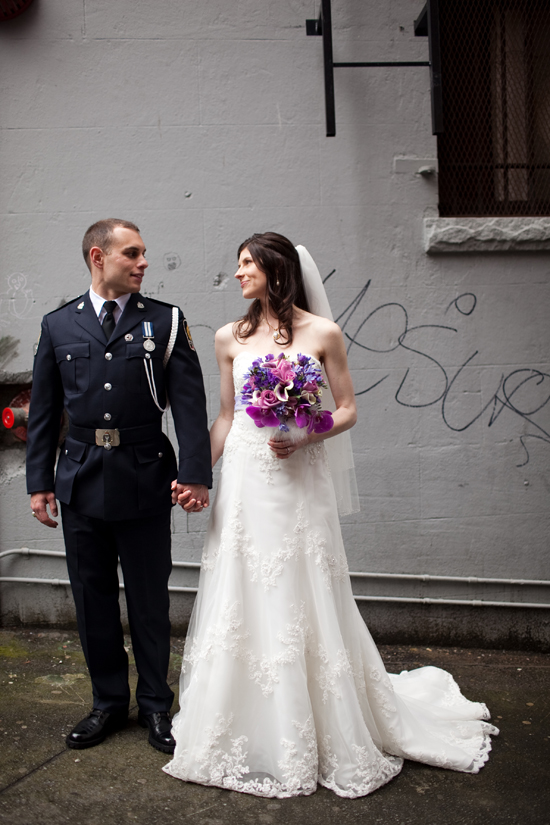 Bride and groom hold hands on their wedding day