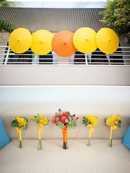 Umbrella decor and yellow protea bridesmaid bouquets