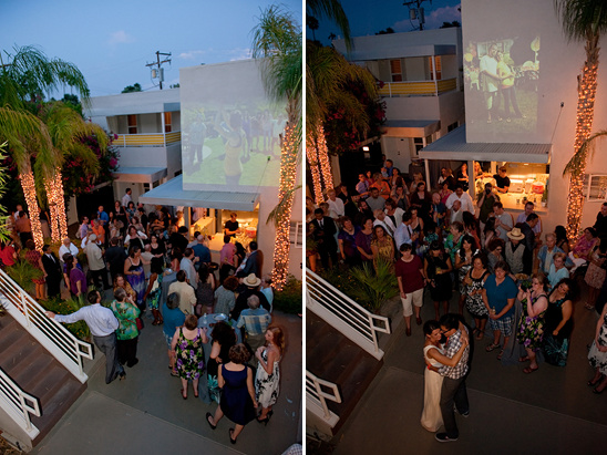 Outdoor wedding reception with projected photos
