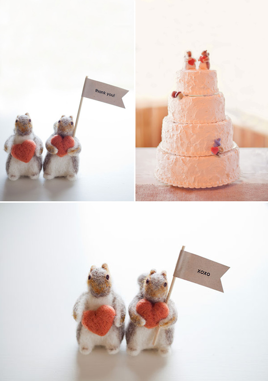 Cute squirrels holding hearts wedding cake toppers