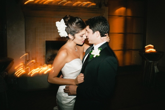 Bride and groom share an intimate moment wedding reception