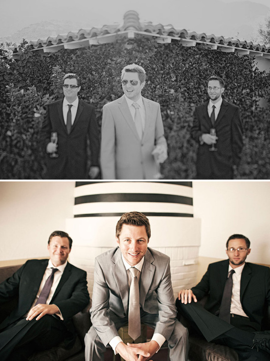 Groomsmen in suits pose for wedding photo