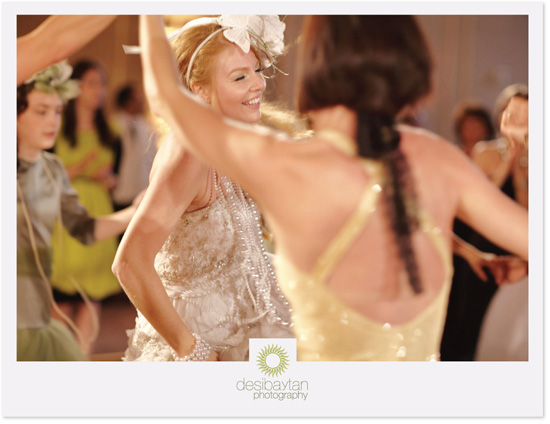Happy bride dancing at wedding reception