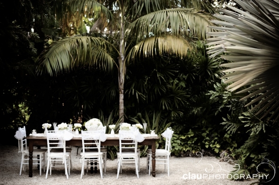 Outdoor wedding reception table with floral decor