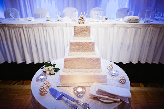Beautiful wedding cake, four tiers, white frosting