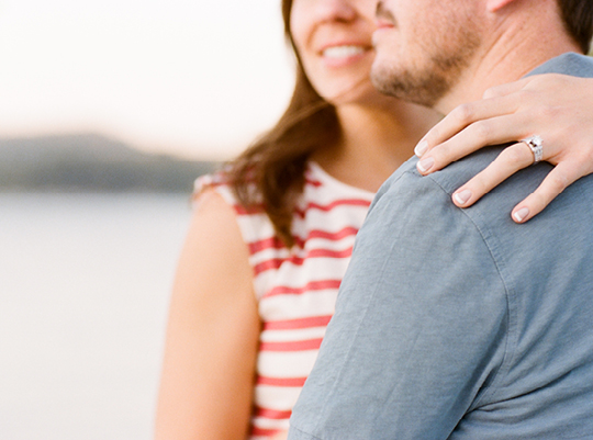Romantic couple embracing outdoors, showing affection