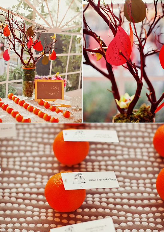 Wedding reception decorations, oranges and trees