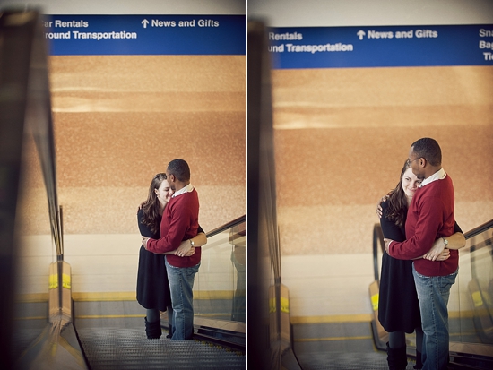 Couple embraces on escalator, airport romance