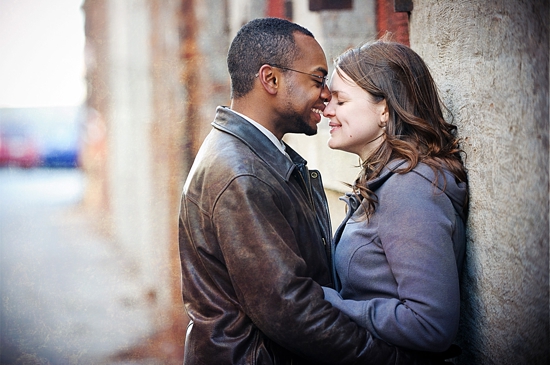 Romantic couple sharing a tender moment in the city