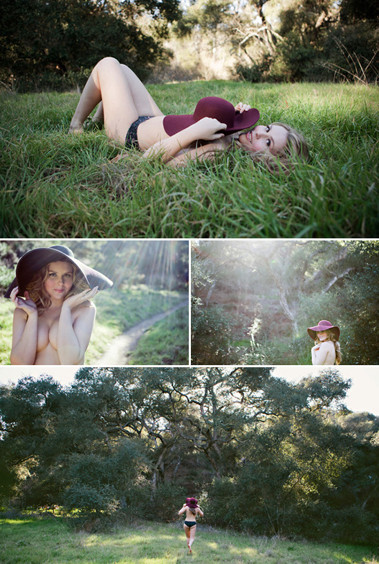 Woman in field, wearing hat, enjoying nature