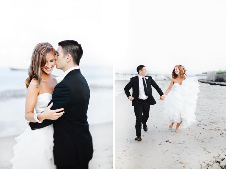 Bride and groom embracing and running on the beach