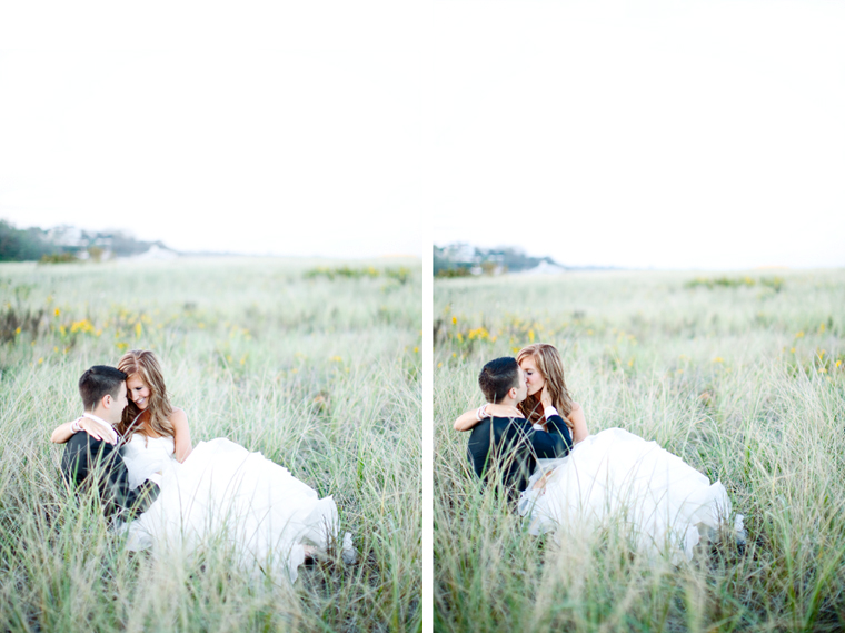 Newlyweds share a kiss in a field of tall grass