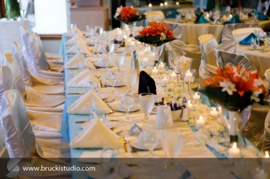 Elegant wedding reception table with flowers and candles