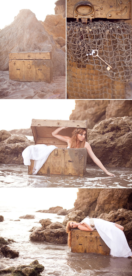 Bride in wooden chest on beach