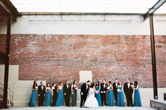 Wedding party teal dresses brick wall