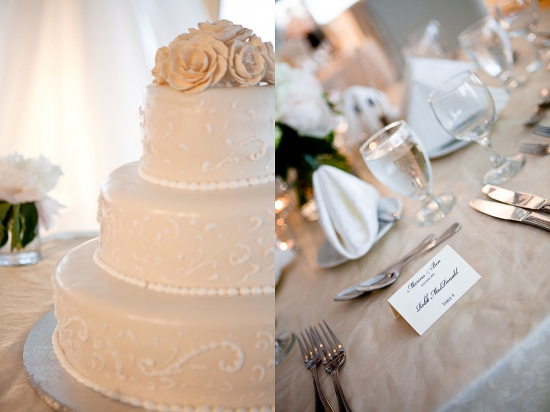 Elegant three-tiered wedding cake with floral adornment