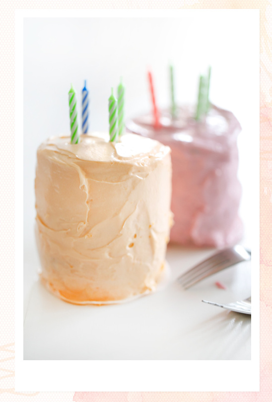 Birthday cakes with candles, light peach and pink