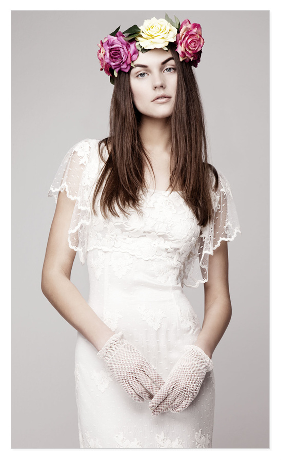 Bride in floral crown, lace dress, and gloves