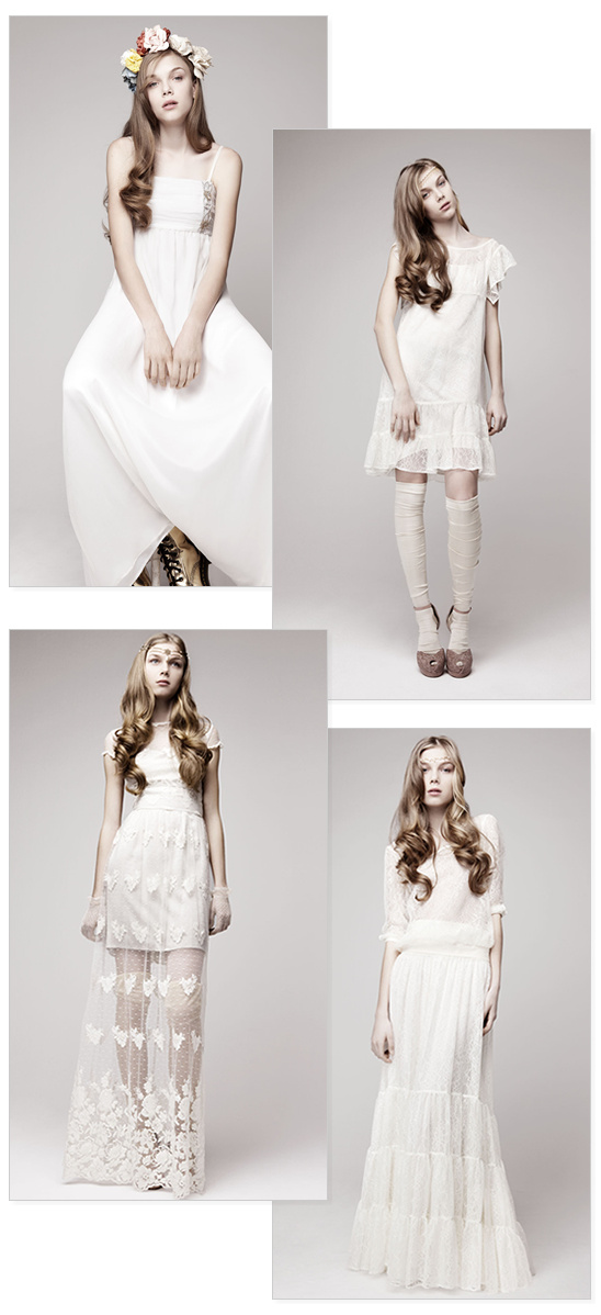 Four models in elegant white dresses