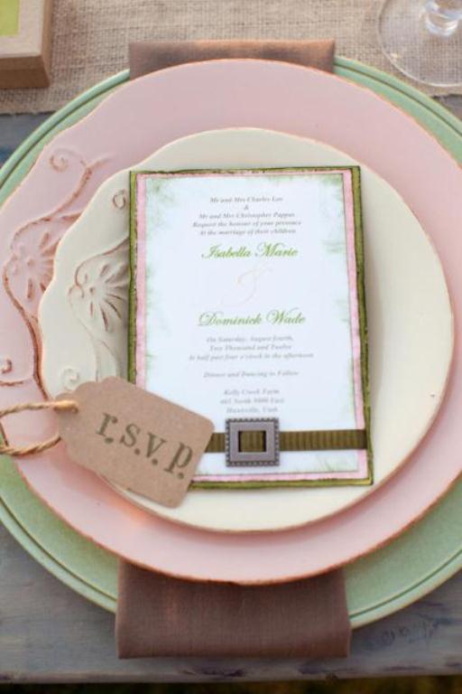 Elegant wedding RSVP card on pastel plates
