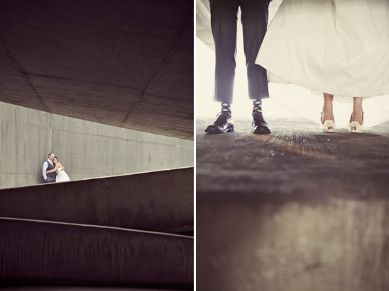 Wedding couple under a modern concrete structure, an artistic shot