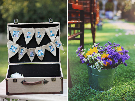 Wedding decor with suitcase and floral arrangements