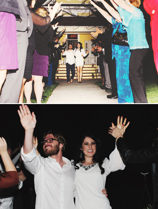 Bride and groom cheered during wedding exit tunnel