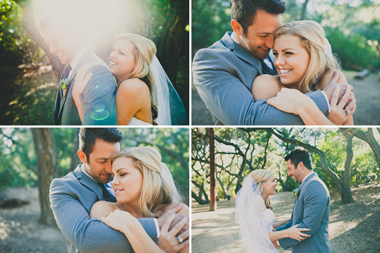 Happy bride and groom hugging in nature at their wedding