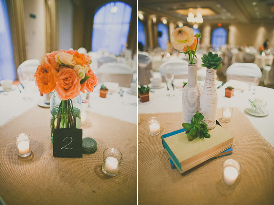 Wedding table decor roses candles and book centerpieces