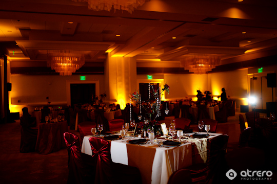 Elegant wedding reception hall with tables and chandeliers