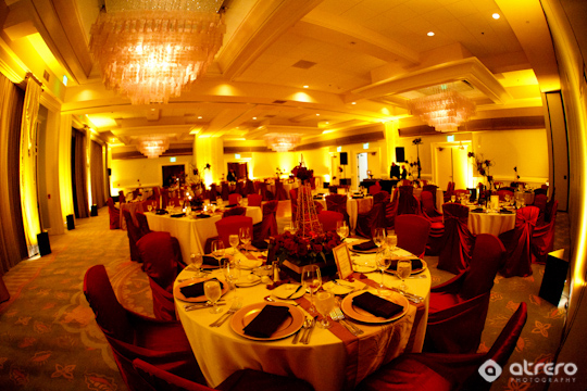 Elegant banquet hall setting with tables and chairs