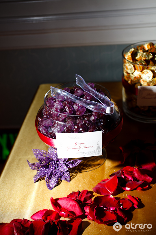 A beautiful display of grape gummy bears and rose petals for event