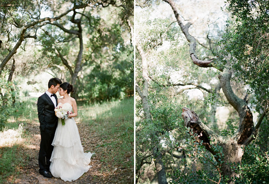 Here's an alt tag option:

Happy couple embraces in wooded wedding setting