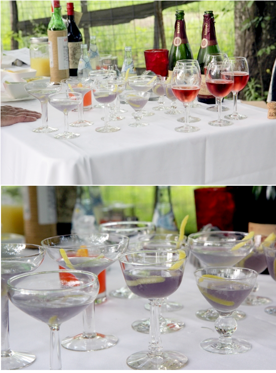 Table with assorted drinks, champagne bottles and cocktails