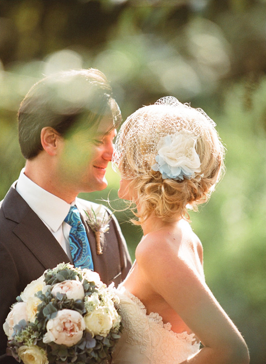 Bride and groom embrace on their beautiful wedding day