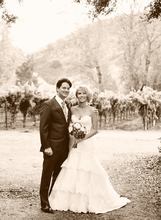 Bride and groom in wedding attire outdoor scenery
