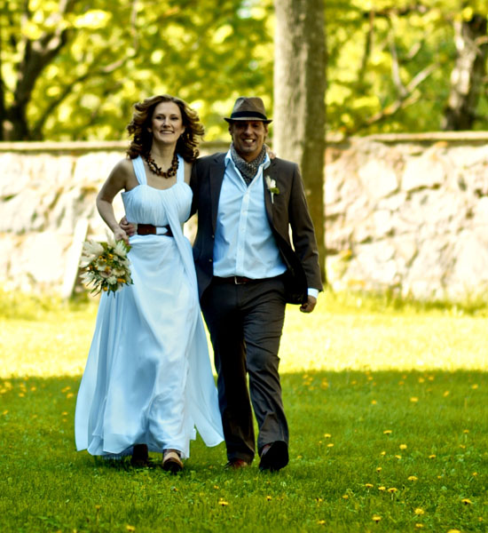 Happy couple walking down aisle, wedding day