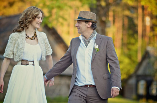 Elegant bride and groom in rustic setting