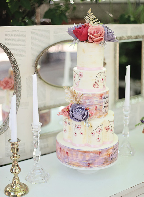 Pretty floral tiered wedding cake with pastel colors